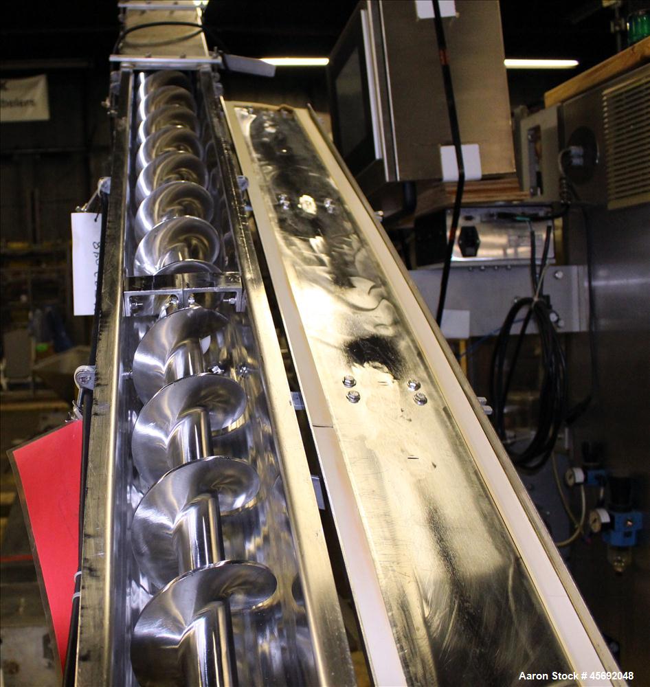 Used S. Howes Split Tube Screw Conveyor, Stainless Steel. 5" diameter x 167" long screw. Driven by 1 hp, 208-230/460, 1740 rpm, washdown motor. 36" diameter feed hopper with agitator. Driven by 1 hp,...