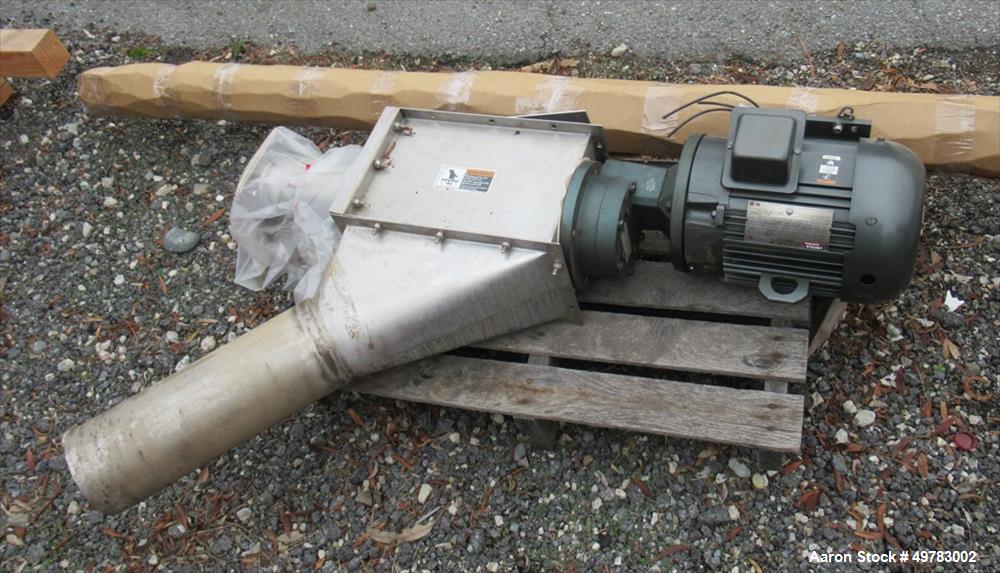Used Spiroflow Stainless Steel Flexible Screw Conveyor, Model 412B19. Approximate 3" diameter x 20' long screw, inside 4" diameter stainless steel pipe/tube. Driven by a 5hp, 3/60/230/460 volt, 1740 ...