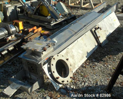 Used Thomas Conveyor Screw Conveyor, 316 Stainless Steel, Horizontal. 8" diameter x 213" long x 4" pitch screw. 10" end top feed, 10" x 10" end bottom outlet.Top bolt on cover with (2) 10" x 10" open...