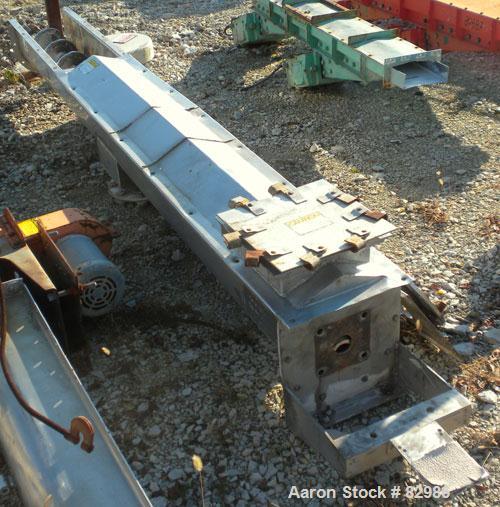 Used Thomas Conveyor Screw Conveyor, 316 Stainless Steel, Horizontal. 8" diameter x 213" long x 4" pitch screw. 10" end top feed, 10" x 10" end bottom outlet.Top bolt on cover with (2) 10" x 10" open...