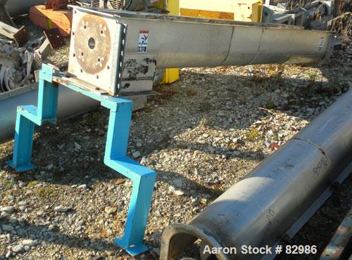 Used Thomas Conveyor Screw Conveyor, 316 Stainless Steel, Horizontal. 8" diameter x 213" long x 4" pitch screw. 10" end top feed, 10" x 10" end bottom outlet.Top bolt on cover with (2) 10" x 10" open...