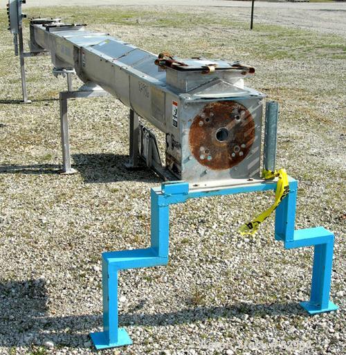 Used Thomas Conveyor Screw Conveyor, 316 Stainless Steel, Horizontal. 8" diameter x 213" long x 4" pitch screw. 10" end top feed, 10" x 10" end bottom outlet.Top bolt on cover with (2) 10" x 10" open...