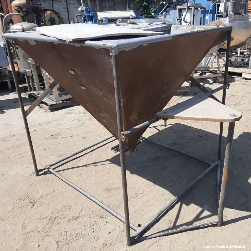 Used Screw Conveyor with Explosion proof motor and carbon steel hopper. Includes 4" diameter x 14'6" long screw, carbon steel conveyor tube measuring 15' long with 5" diameter discharge, and carbon s...