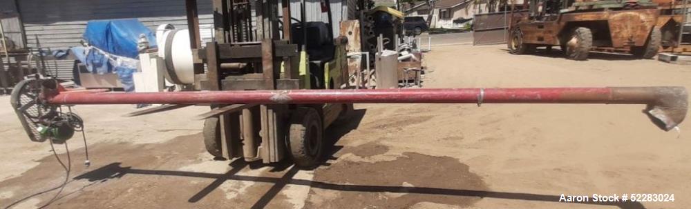 Used Screw Conveyor with Explosion proof motor and carbon steel hopper. Includes 4" diameter x 14'6" long screw, carbon steel conveyor tube measuring 15' long with 5" diameter discharge, and carbon s...