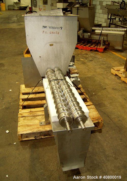 Used Vanmark Potato Feeder. (2) Approximate 3 1/2" diameter x 42" long side-by-side 316 stainless steel screws. Top feed with hopper, end bottom outlet. Driven by a 1 hp, 3/60/330/575 volt, 1700 rpm ...