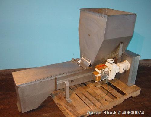 Used Vanmark Potato Feeder. (2) Approximate 3 1/2" diameter x 42" long side-by-side 316 stainless steel screws. Top feed with hopper, end bottom outlet. Driven by a 1 hp, 3/60/330/575 volt, 1700 rpm ...
