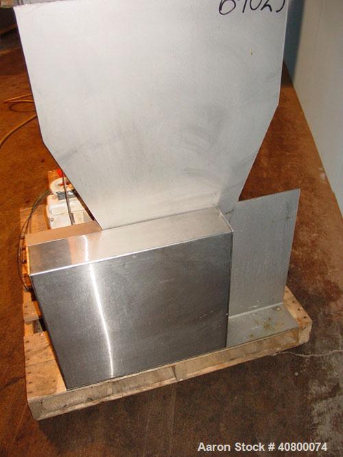 Used Vanmark Potato Feeder. (2) Approximate 3 1/2" diameter x 42" long side-by-side 316 stainless steel screws. Top feed with hopper, end bottom outlet. Driven by a 1 hp, 3/60/330/575 volt, 1700 rpm ...