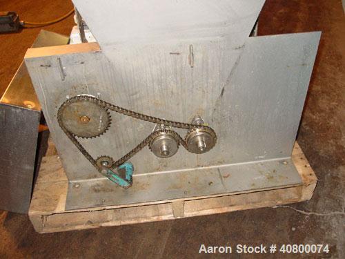 Used Vanmark Potato Feeder. (2) Approximate 3 1/2" diameter x 42" long side-by-side 316 stainless steel screws. Top feed with hopper, end bottom outlet. Driven by a 1 hp, 3/60/330/575 volt, 1700 rpm ...