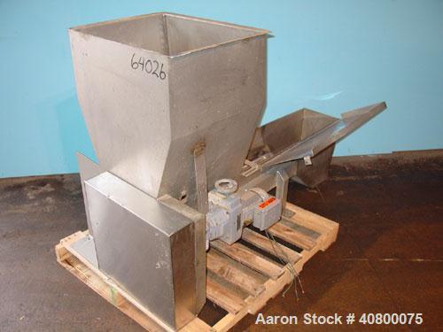 Used Vanmark Potato Feeder. (2) Approximate 3 1/2'' diameter x 42'' long side-by-side 316 stainless steel screws. Top feed with hopper, end bottom outlet. Driven by a 1 hp, 3/60/330/575 volt, 1700 rp...