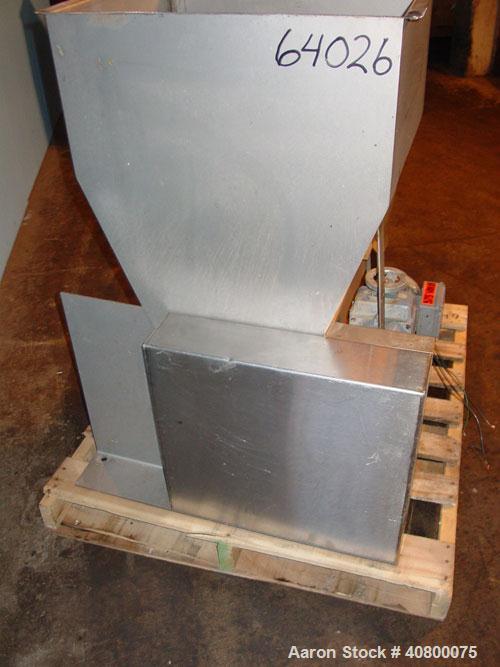 Used Vanmark Potato Feeder. (2) Approximate 3 1/2'' diameter x 42'' long side-by-side 316 stainless steel screws. Top feed with hopper, end bottom outlet. Driven by a 1 hp, 3/60/330/575 volt, 1700 rp...