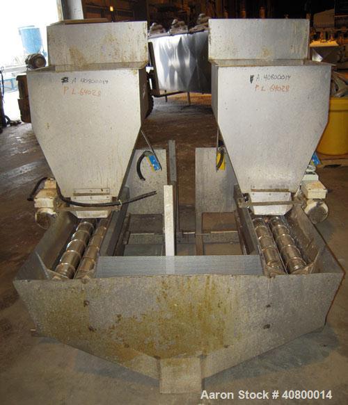 Used Vanmark Potato Feeder Consisting of (2) feeders, each equipped with (2) approximate 3 1/2" diameter x 42" long side-by-side 316 stainless steel screws. Top feed with hopper, end bottom outlet. D...