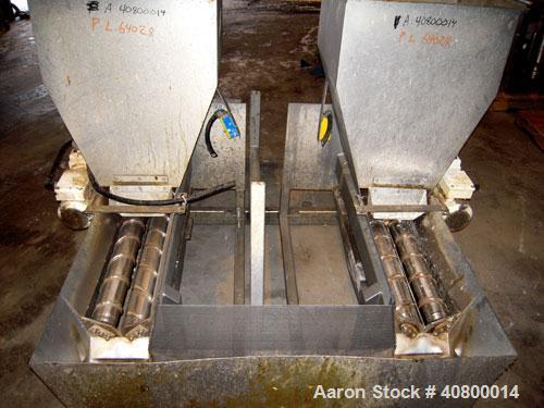 Used Vanmark Potato Feeder Consisting of (2) feeders, each equipped with (2) approximate 3 1/2" diameter x 42" long side-by-side 316 stainless steel screws. Top feed with hopper, end bottom outlet. D...
