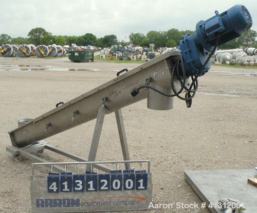 Used Wam Group Inclined Screw Conveyor, Type CXU2L020027511, 304 Stainless Steel. Approximate 8" diameter x 106" long x 4" pitch screw. Trough measures 9’’ wide x 106’’ long x 10’’ deep. (1) Section ...
