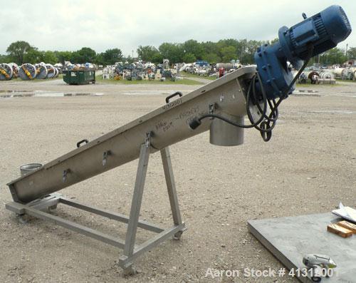 Used Wam Group Inclined Screw Conveyor, Type CXU2L020027511, 304 Stainless Steel. Approximate 8" diameter x 106" long x 4" pitch screw. Trough measures 9’’ wide x 106’’ long x 10’’ deep. (1) Section ...