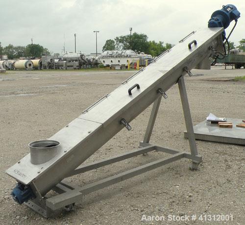 Used Wam Group Inclined Screw Conveyor, Type CXU2L020027511, 304 Stainless Steel. Approximate 8" diameter x 106" long x 4" pitch screw. Trough measures 9’’ wide x 106’’ long x 10’’ deep. (1) Section ...