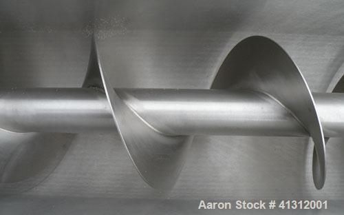 Used Wam Group Inclined Screw Conveyor, Type CXU2L020027511, 304 Stainless Steel. Approximate 8" diameter x 106" long x 4" pitch screw. Trough measures 9’’ wide x 106’’ long x 10’’ deep. (1) Section ...