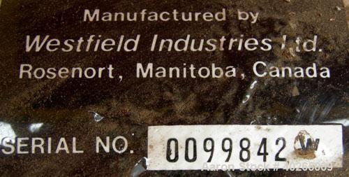 Used Westfield Industries Screw Conveyor, carbon steel. 6" diameter x 21' long x 5" pitch screw. Aproximate 6 1/4" diameter enclosed tube. 14" x 14" feed hopper, 7 1/2" end bottom outlet. Driven by a...