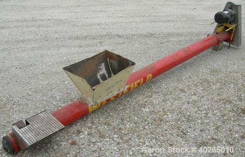Used Westfield Industries Screw Conveyor, Carbon Steel. 6" diameter x 130" long x 6" pitch screw. Approximate 6 1/4" diameter enclosed tube. 19" x 13" feed hopper, end bottom outlet. Driven by a 1/2 ...