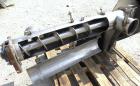 Used Enclosed Tube Screw Conveyor, Stainless Steel. 6'' Diameter x 28'' long 304 stainless steel screw. 301 Stainless steel tube approximately 7'' diameter x 48'' long, side access door, 6'' inlet/ou...
