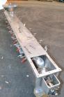 Used Screw Conveyor, 304 Stainless Steel, Horizontal. Approximate 9'' diameter x 141'' long x 4-1/2'' pitch screw. Trough 10'' wide x 11'' deep with (3) cover sections. Driven by a 2 hp, 3/60/230/460...
