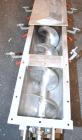 Used Screw Conveyor, 304 Stainless Steel, Horizontal. Approximate 9'' diameter x 141'' long x 4-1/2'' pitch screw. Trough 10'' wide x 11'' deep with (3) cover sections. Driven by a 2 hp, 3/60/230/460...