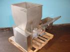 Used Vanmark Potato Feeder. (2) Approximate 3 1/2'' diameter x 42'' long side-by-side 316 stainless steel screws. Top feed with hopper, end bottom outlet. Driven by a 1 hp, 3/60/330/575 volt, 1700 rp...