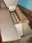 Used Vanmark Potato Feeder. (2) Approximate 3 1/2'' diameter x 42'' long side-by-side 316 stainless steel screws. Top feed with hopper, end bottom outlet. Driven by a 1 hp, 3/60/330/575 volt, 1700 rp...