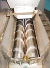 Used Vanmark Potato Feeder. (2) Approximate 3 1/2'' diameter x 42'' long side-by-side 316 stainless steel screws. Top feed with hopper, end bottom outlet. Driven by a 1 hp, 3/60/330/575 volt, 1700 rp...