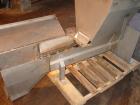 Used Vanmark Potato Feeder. (2) Approximate 3 1/2'' diameter x 42'' long side-by-side 316 stainless steel screws. Top feed with hopper, end bottom outlet. Driven by a 1 hp, 3/60/330/575 volt, 1700 rp...