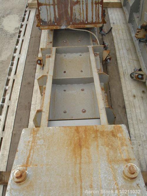 Used 24" Wide x 14’ Long Eriez Electro-Magnetic vibrating feeder. Vibrating feeder / conveyor has two Eriez electro-magnetic drives. Model 98B, 460 volt, 60 hz, 17.5 amps per drive. Unit is reported ...