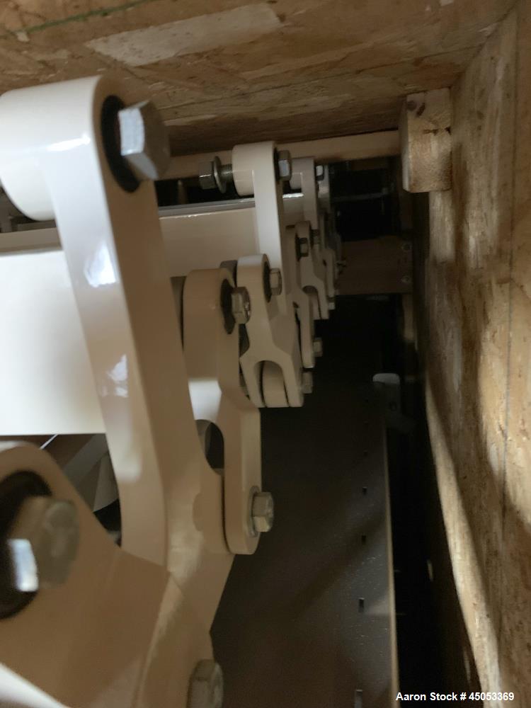 Unused- FEC Food Engineering Corp X-Force Horzonital Motion Conveyor, 304 Stainless Steel. Approximately 21" wide x 12' long pan. Driven by a 1hp, 3/60/230/460 volt, 1200 rpm drive motor. Equip# CY-1...