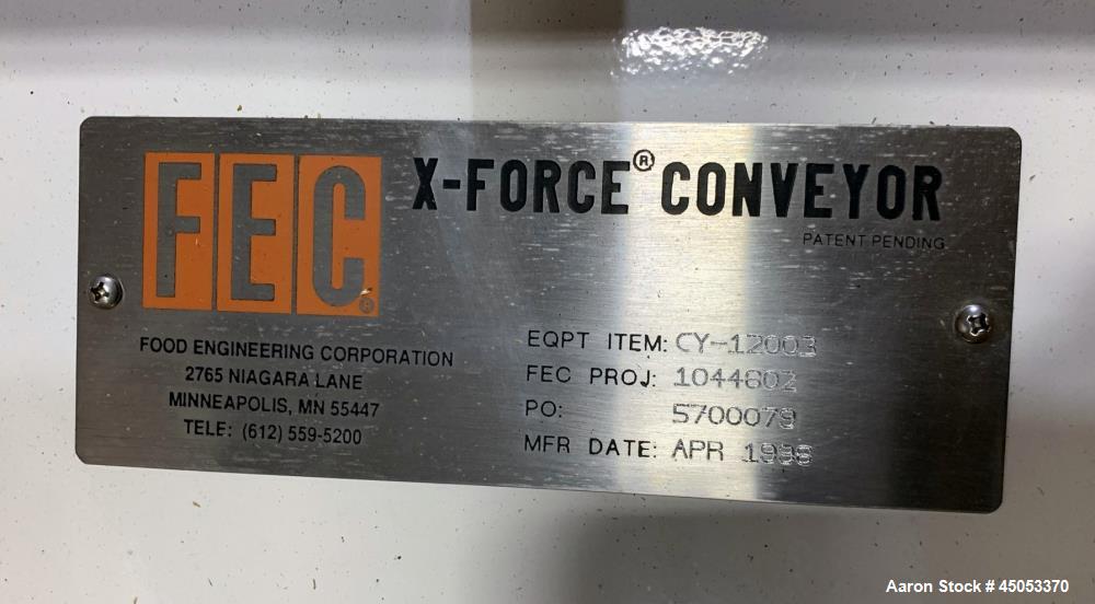 Unused- FEC Food Engineering Corp X-Force Horzonital Motion Conveyor, 304 Stainless Steel. Approximately 21" wide x 12' long pan. Driven by a 1hp, 3/60/230/460 volt, 1200 rpm drive motor. Equip# CY-1...