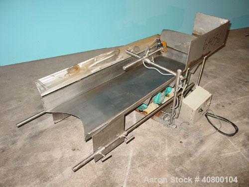 Used- H Tech Vibratory Conveyor, stainless steel. 16'' wide x 42'' long x 3'' high sides vibrating pan. Syntron speed contro...