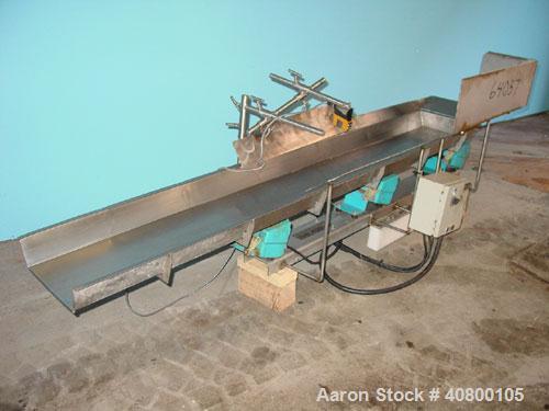Used H Tech Vibratory Conveyor, Stainless Steel. 10-1/2'' Wide x 76'' long x 3'' high sides vibrating pan. Syntron speed controller. Mounted on a carbon steel base.