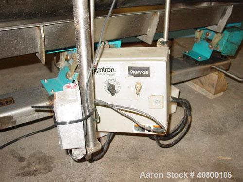 Used H Tech Vibratory Conveyor, Stainless Steel. 10-1/2'' Wide x 74'' long x 3'' high sides vibrating pan. Syntron speed controller. Mounted on a carbon steel base.