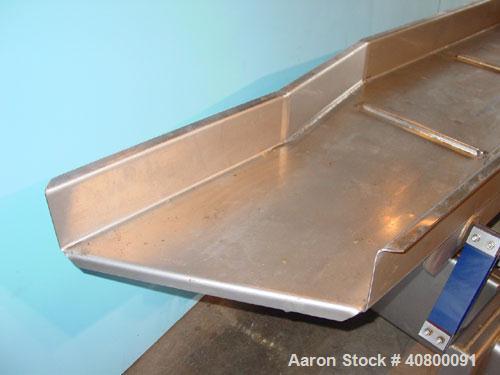 Used Key Technology ISO-FLO Vibratory Conveyor, Model 435532.1, 304 stainless steel. Maximum stroke approximately 8". Conveyor pan 5" deep, end feed section 37" wide x 34" long, middle section 19" wi...