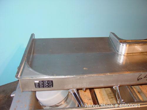 Used Key Technology ISO-FLO Vibratory Conveyor, Model 435532.1, 304 stainless steel. Maximum stroke approximately 8". Conveyor pan 5" deep, end feed section 37" wide x 34" long, middle section 19" wi...