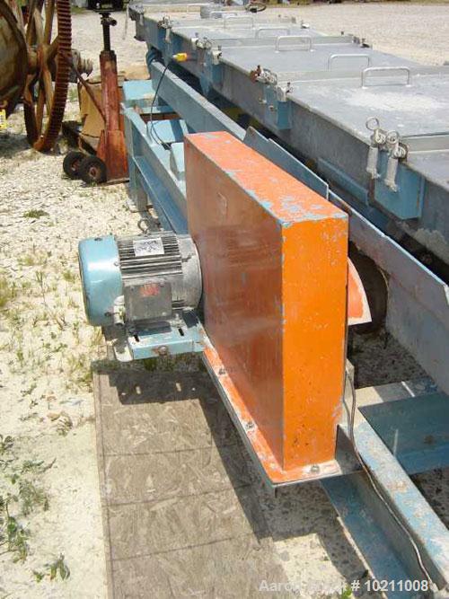 Used-24" Wide x 29" Long Stainless Steel Covered Vibrating Incline Conveyor, model VC-24SD-31B, manufactured by Professional...
