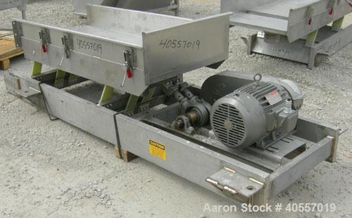 Used Cardwell vibratory conveyor, model VC-1659, 304 stainless steel. 24" wide x 131" long x 6 3/4" tall sides. 6" end bottom outlet, 15" long end overs section. Driven by a 5 hp, 3/60/575 volt, 1160...