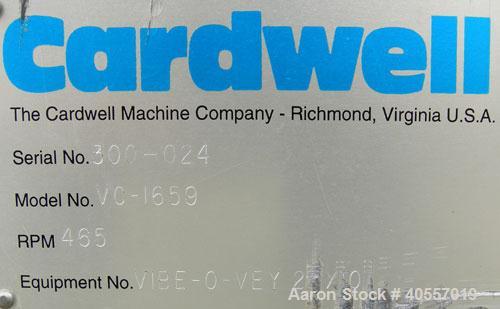 Used Cardwell vibratory conveyor, model VC-1659, 304 stainless steel. 24" wide x 131" long x 6 3/4" tall sides. 6" end bottom outlet, 15" long end overs section. Driven by a 5 hp, 3/60/575 volt, 1160...