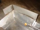 Used H Tech Vibratory Conveyor, stainless steel. 16'' wide x 42'' long x 3'' high sides vibrating pan. Syntron speed controller. Mounted on a carbon steel base.