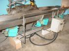 Used H Tech Vibratory Conveyor, Stainless Steel. 10-1/2'' Wide x 76'' long x 3'' high sides vibrating pan. Syntron speed controller. Mounted on a carbon steel base.