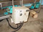 Used H Tech Vibratory Conveyor, Stainless Steel. 10-1/2'' Wide x 76'' long x 3'' high sides vibrating pan. Syntron speed controller. Mounted on a carbon steel base.