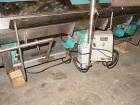 Used H Tech Vibratory Conveyor, Stainless Steel. 10-1/2'' Wide x 74'' long x 3'' high sides vibrating pan. Syntron speed controller. Mounted on a carbon steel base.