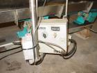 Used H Tech Vibratory Conveyor, Stainless Steel. 10-1/2'' Wide x 74'' long x 3'' high sides vibrating pan. Syntron speed controller. Mounted on a carbon steel base.