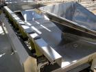 Used Lyco model 9000 vibratory conveyor 40 inches wide x 10 feet long, last used for pouches.