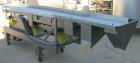 Used Horizontal vibratory conveyor/ screener, 304 stainless steel. Approximately 17
