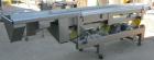 Used Horizontal vibratory conveyor/ screener, 304 stainless steel. Approximately 17