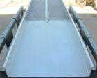 Used Horizontal vibratory conveyor/ screener, 304 stainless steel. Approximately 17