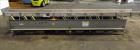 Used Triple S Dynamics Vibrating Conveyor, Model RLEB-18, 304 Stainless Steel. Approximate 18